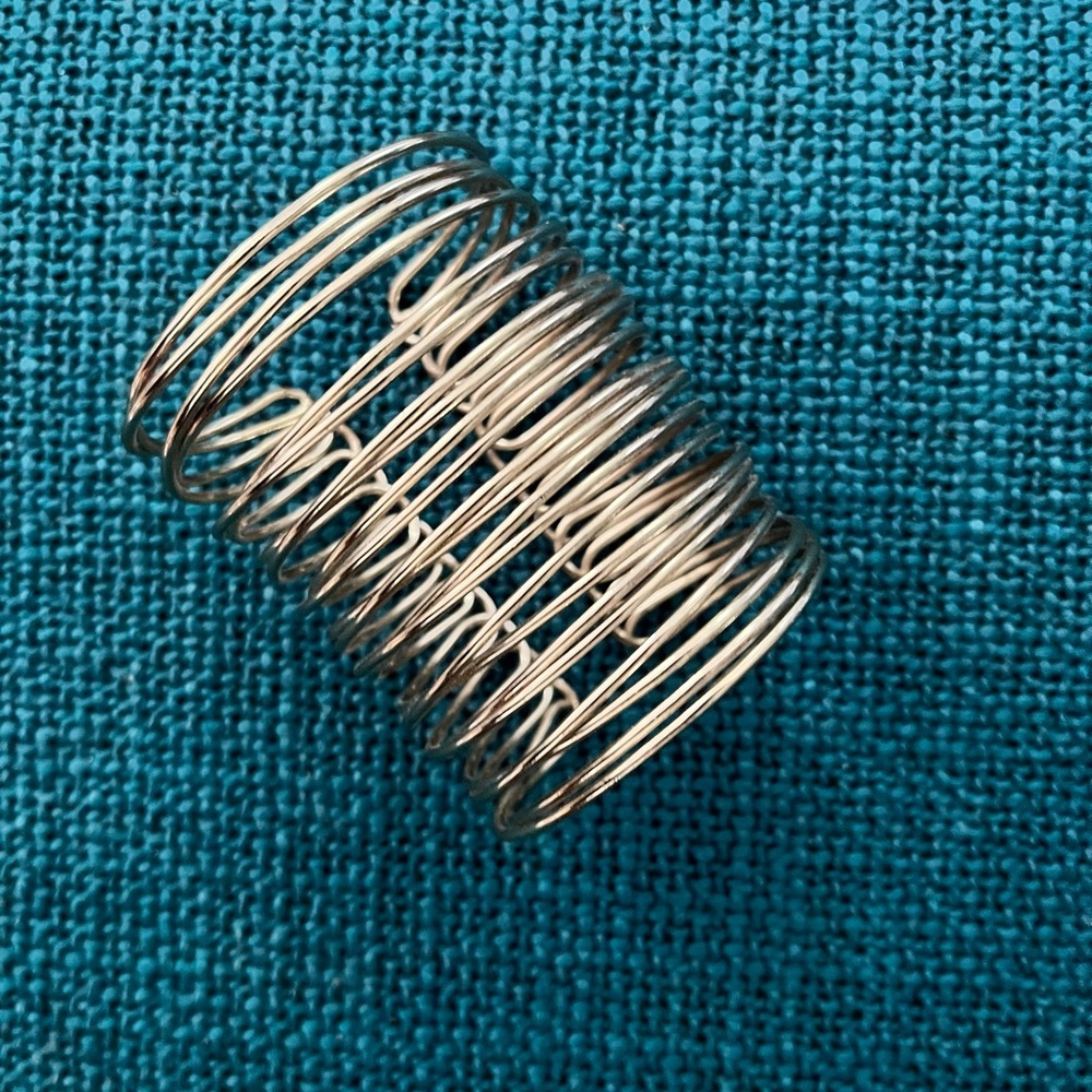 Modern stacked metal bracelet.